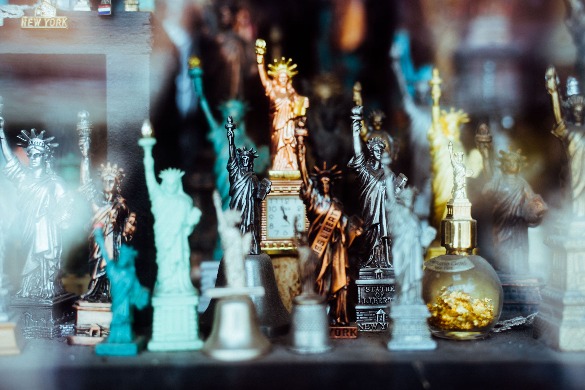 Miniature figures of Statue of Liberty in various colours and sizes